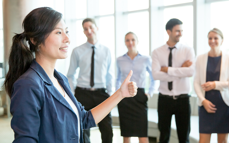 Professional giving thumbs up for verified ESG external assurance